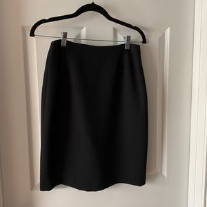 Ellen Tracy - sharp black skirt. Lined, back zipper. No rips or stains. Perfect!